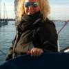 A lady on a sailing boat wearing Bigatmo sunglasses