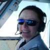 Commercial airline pilot in the flightdeck wearing Bigatmo Meso sunglasses